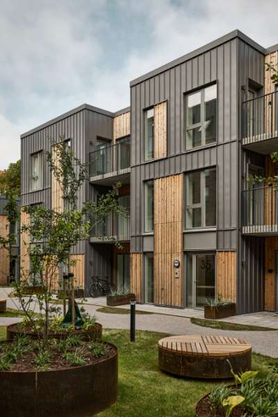 Steel profiles and wood united on the façade of modern homes in Aalborg, Badehusvej 1, 9000 Aalborg